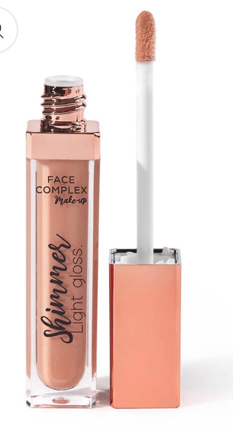 Face Complex Shimmer Light Gloss, un tipo di lucidalabbra.   È un lucidalabbra con effetto brillante e luminoso