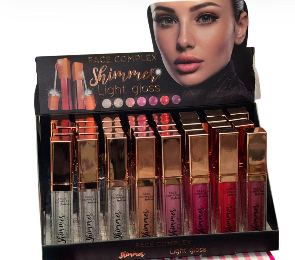 Face Complex Shimmer Light Gloss, un tipo di lucidalabbra.   È un lucidalabbra con effetto brillante e luminoso