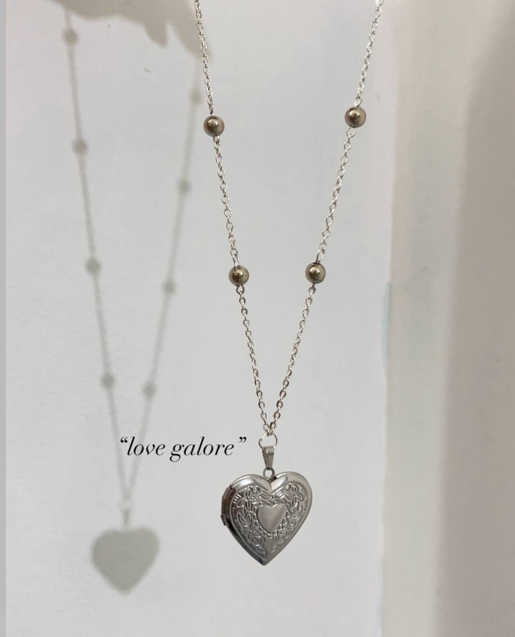 Collana medaglione a cuore che si apre