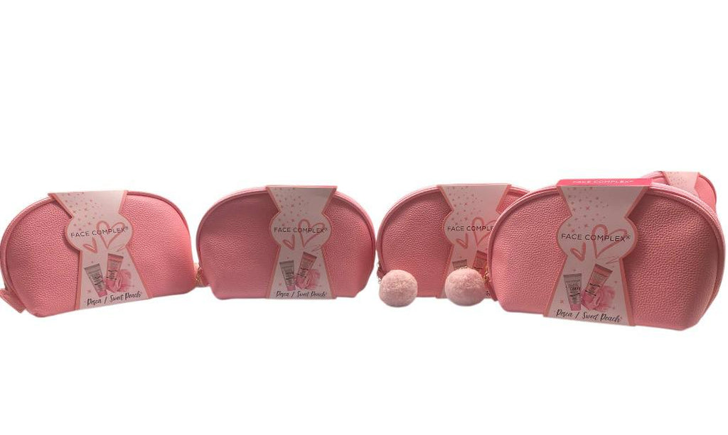 Gift Box - Sweet Peach pochette trendy  comprende bagnoschiuma 100ml , crema corpo 100ml , spugna da bagno